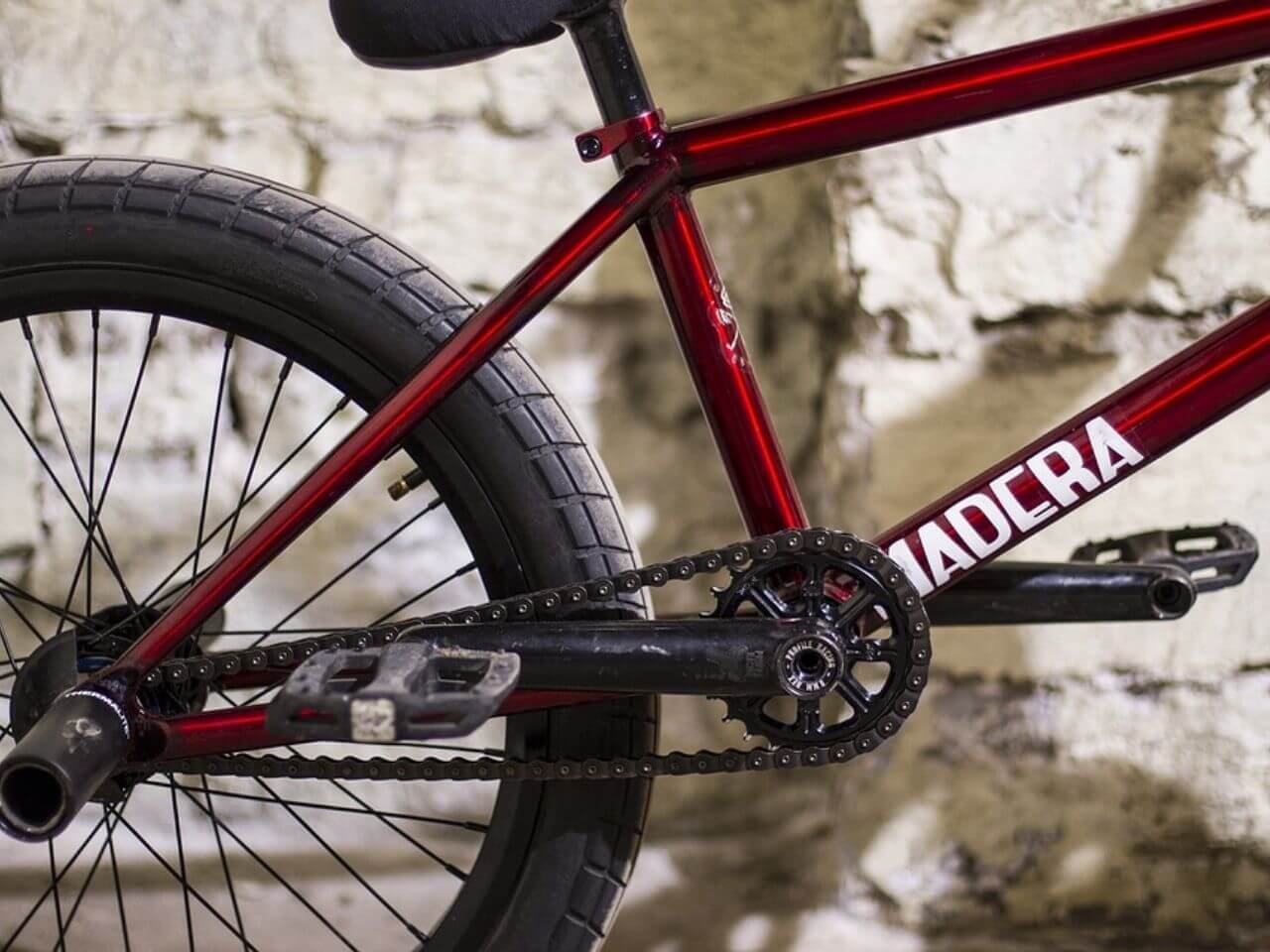 Red BMX Bike against wall
